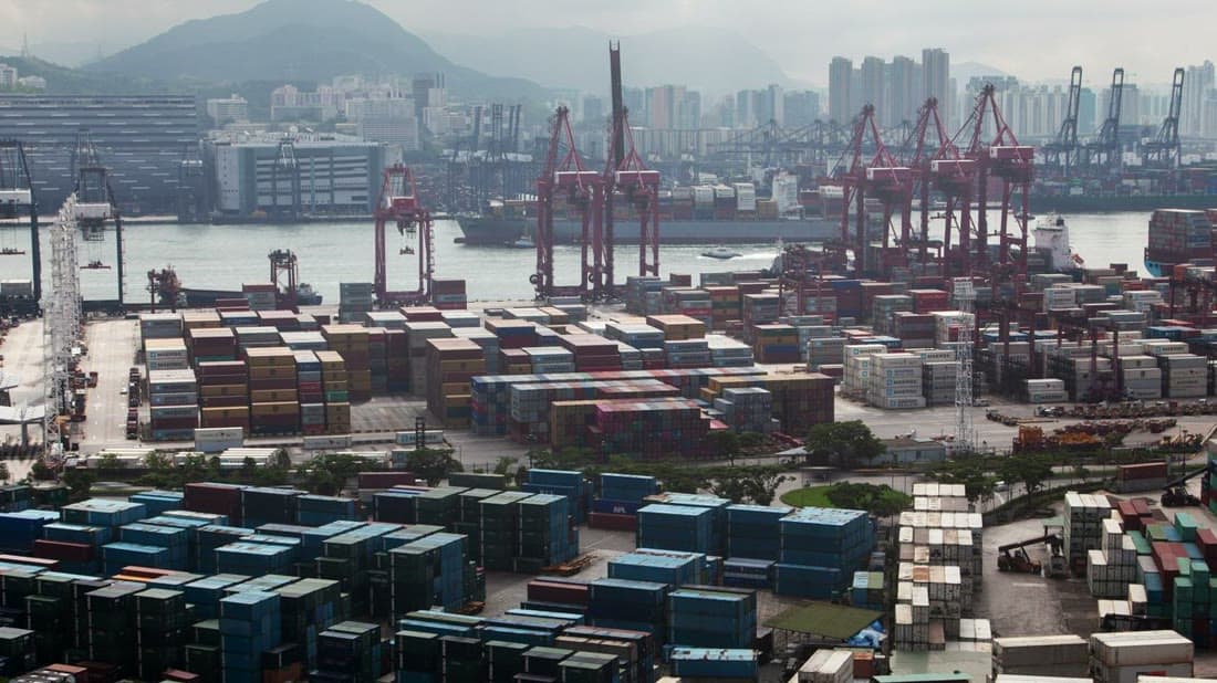Container port with cargo ships and shipping containers