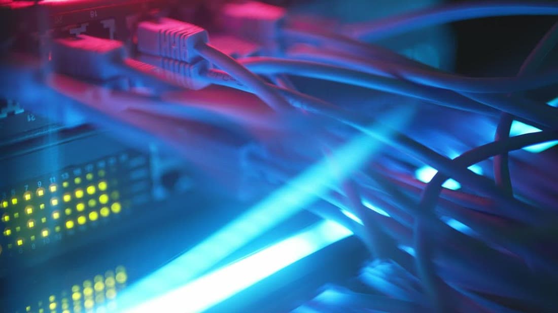 Close-up of fibre optic cables in a server room